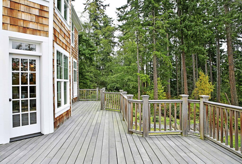 Modern home exterior renovation with backyard upgrade