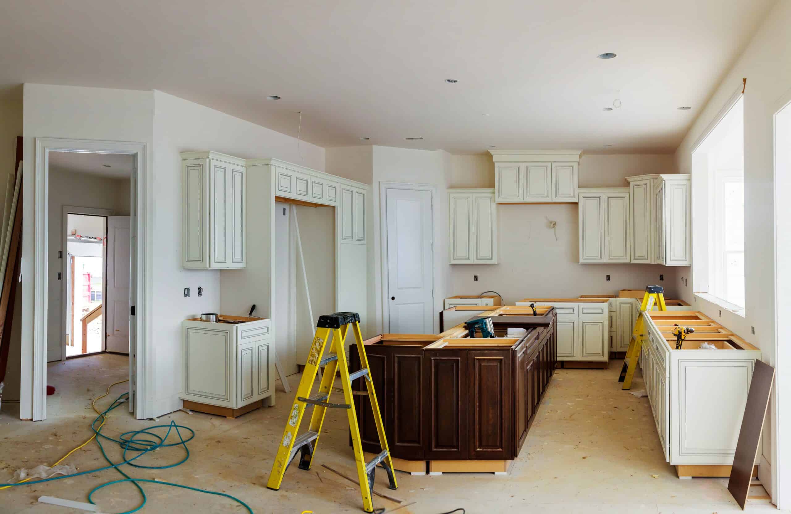 Professional water damage cleanup in progress, with air movers and dehumidifiers strategically placed to dry a flooded room and prevent mold.