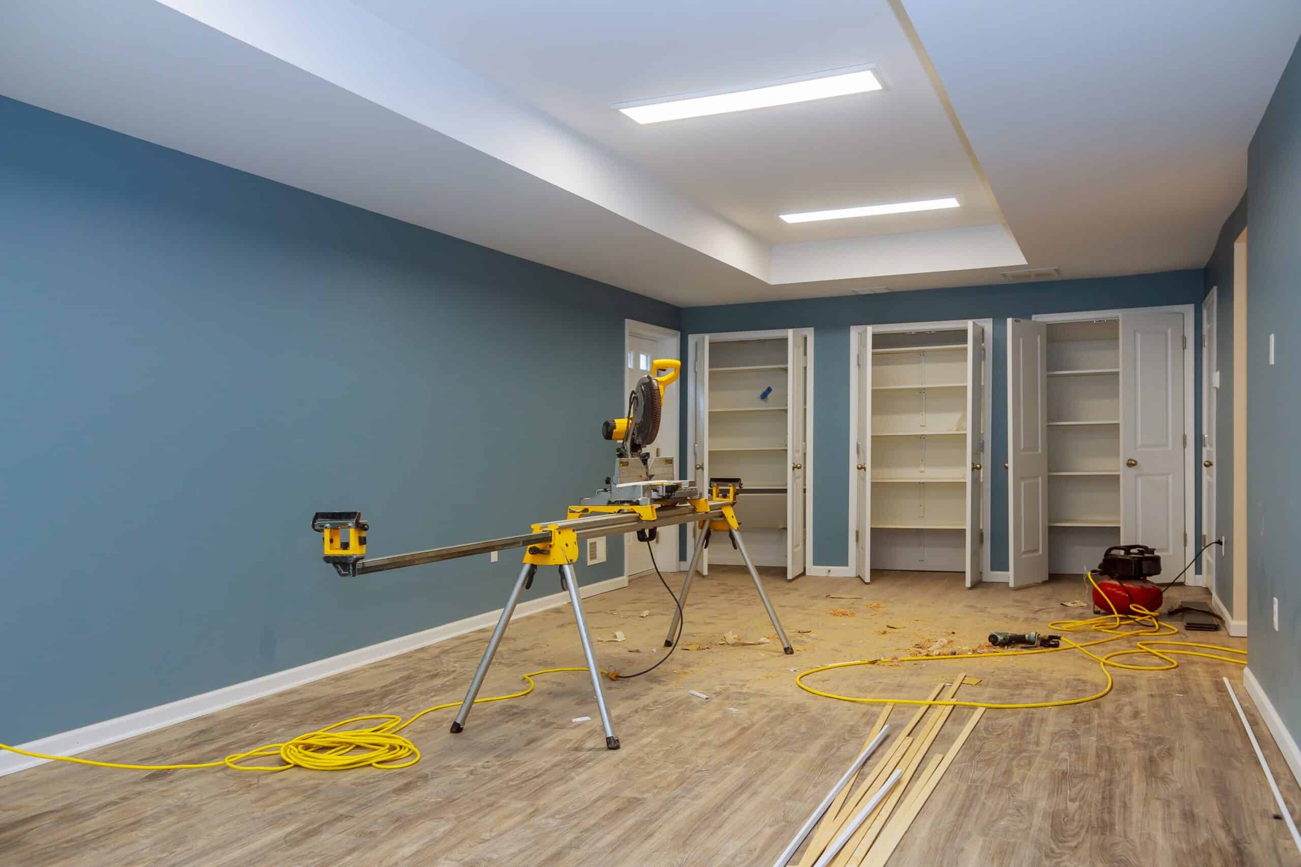 A basement wall after structural repair, reinforced with carbon fiber straps to fix a bowing wall and prevent future damage.