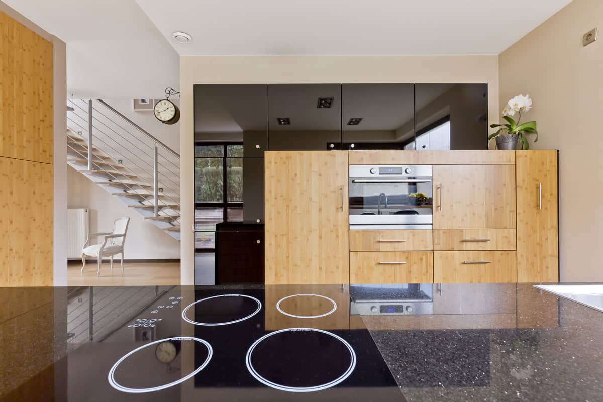 Modern bathroom interior featuring wooden accents by top-rated Orange County contractor.