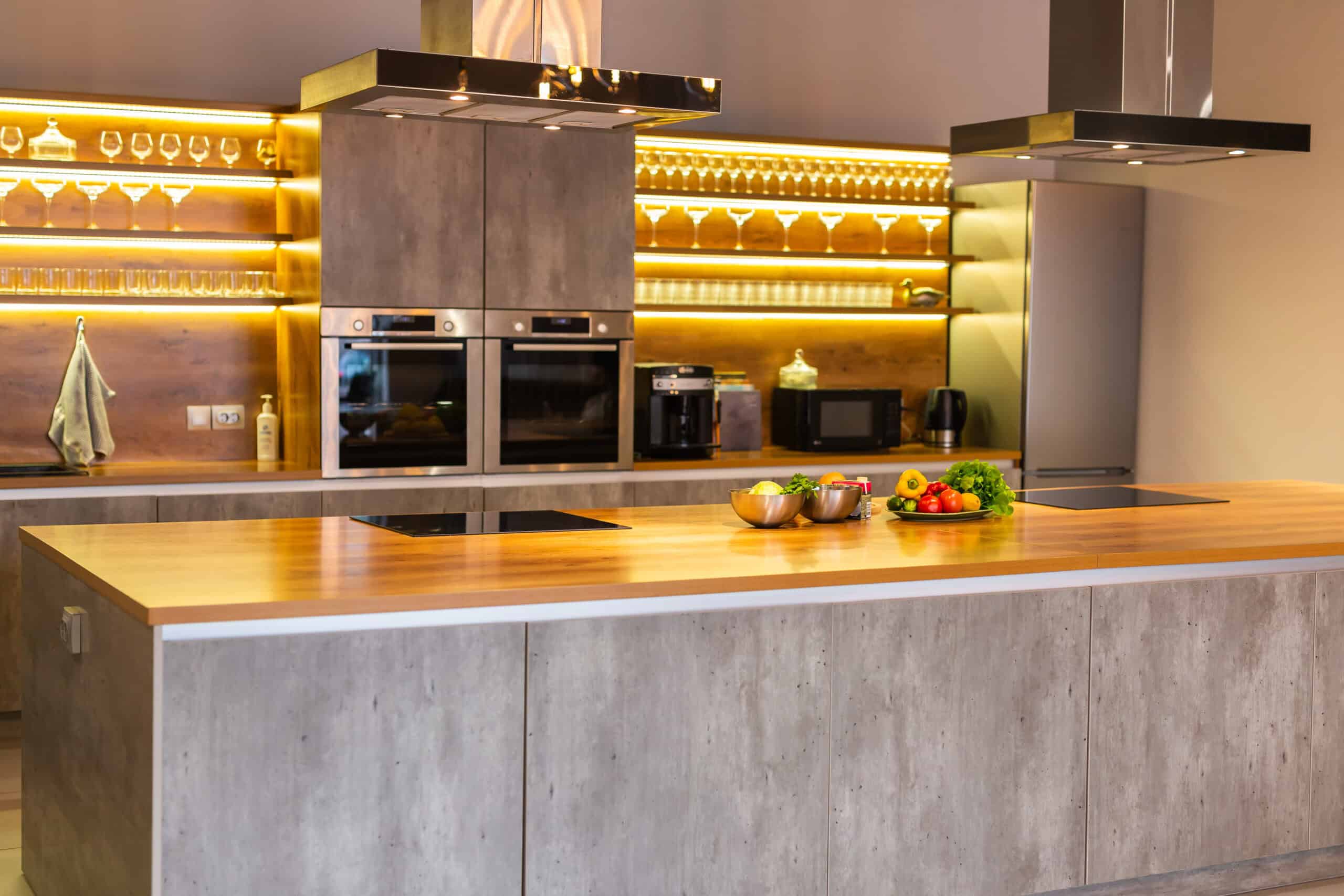 Modern Newport Beach kitchen with contemporary cabinetry and stylish lighting.